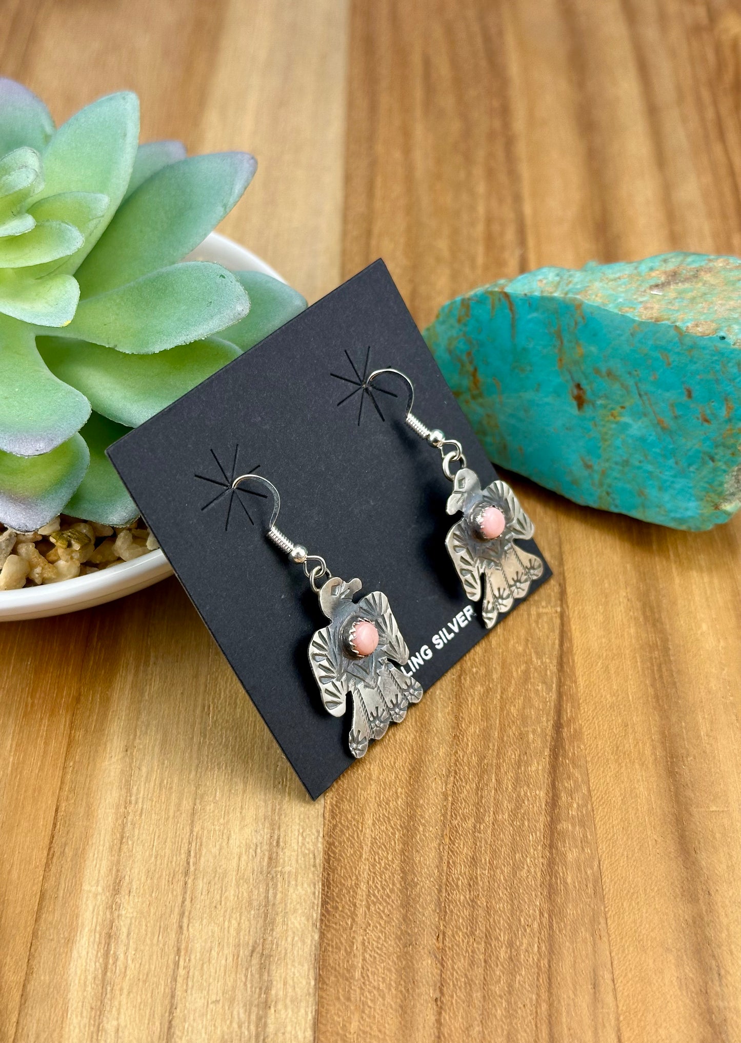 Pink Conch Thunderbird Dangle Earrings